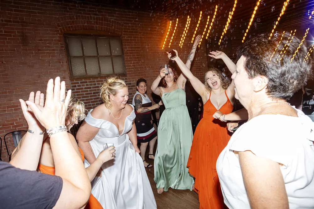 Guests and bride dancing during a wedding at UNION in Kansas City