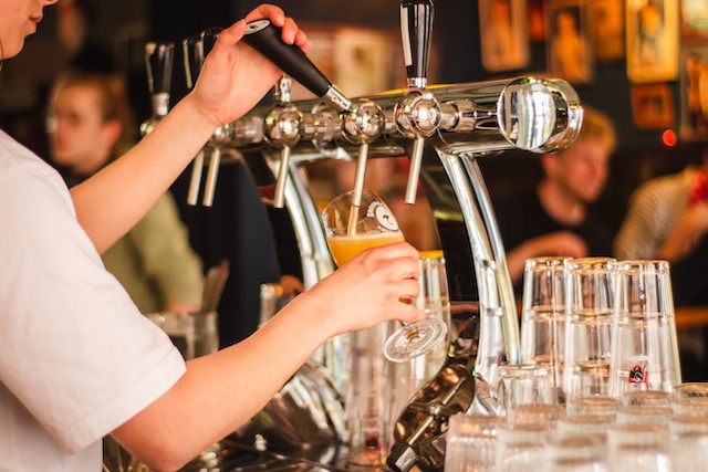 Pouring a beer from a tap