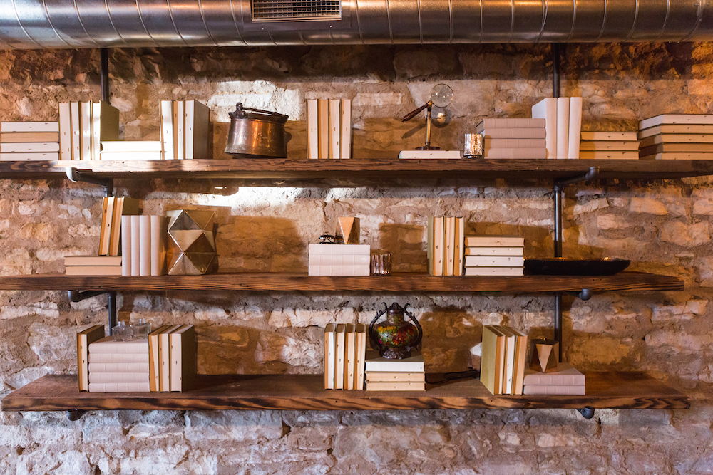 A bookshelf in a speakeasy.