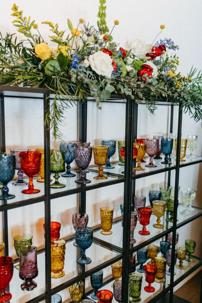 Colorful drinking glasses display in UNION's Speakeasy