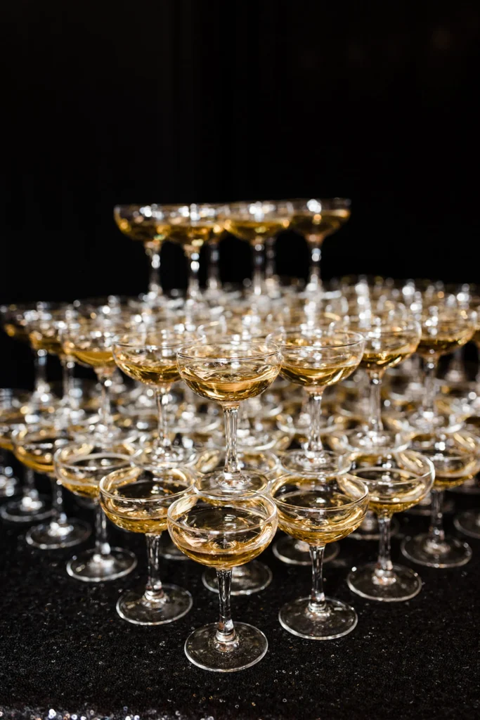 Stacked champagne glasses at a KC wedding reception