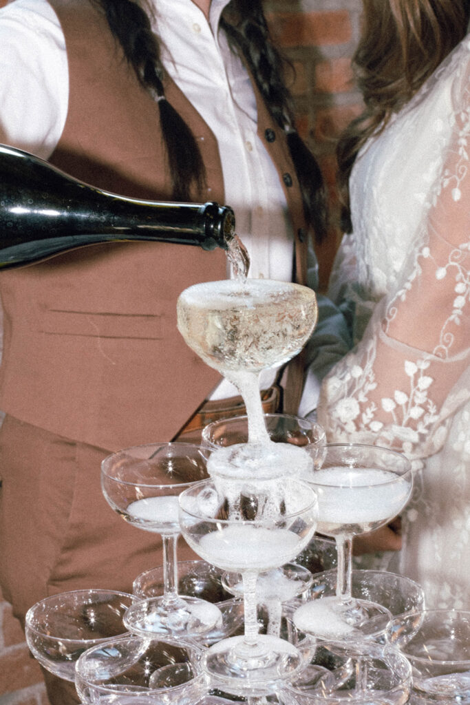 Brides pouring champagne