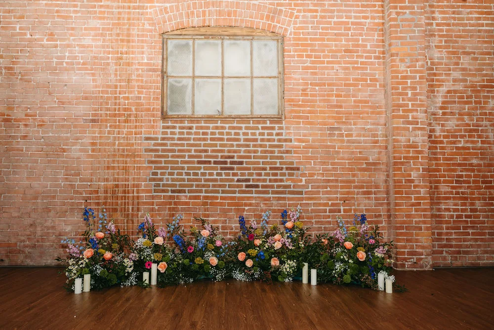 Florals set up for a wedding ceremony at UNION in Kansas City