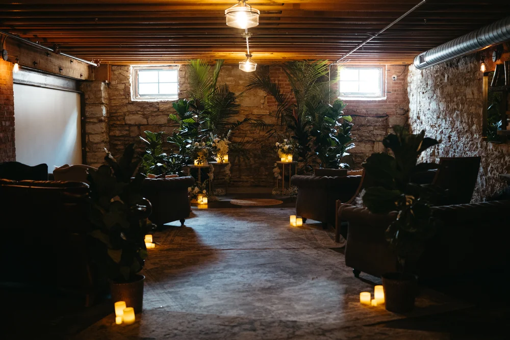 Wedding ceremony setup in The Goldfinch Room at UNION, a Kansas City event venue with intimate speakeasy style