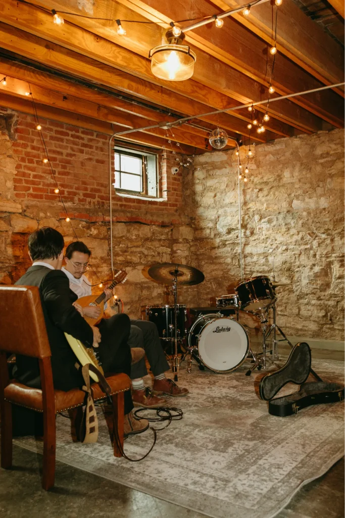 Guests playing live music in The Goldfinch speakeasy.