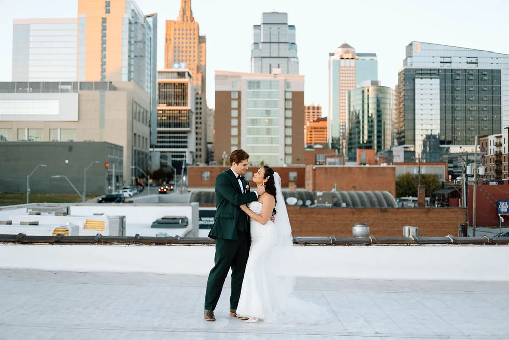 Bride and groom portraits on UNION's rooftop overlooking downtown Kansas City, MO